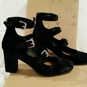 A pair of black heels